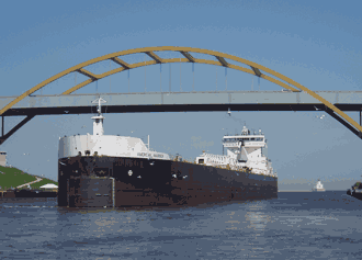 American Mariner coming into the Mooring Basin under the Hoan Bridge. Photo by Greg Stamatelaky