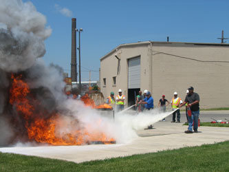 Port staff puts out this Class B fire