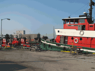 The VIRGINIA, ARKANSAS, and OHIO in Milwaukee, all part of the Great Lakes Towing Company fleet