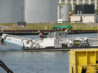 The river skimmer is leaving its dock at the Port to clean the Milwaukee, KK and Menomonee rivers 